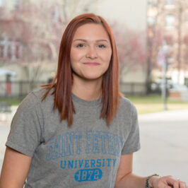 Melanie Mussman smiling at the camera.